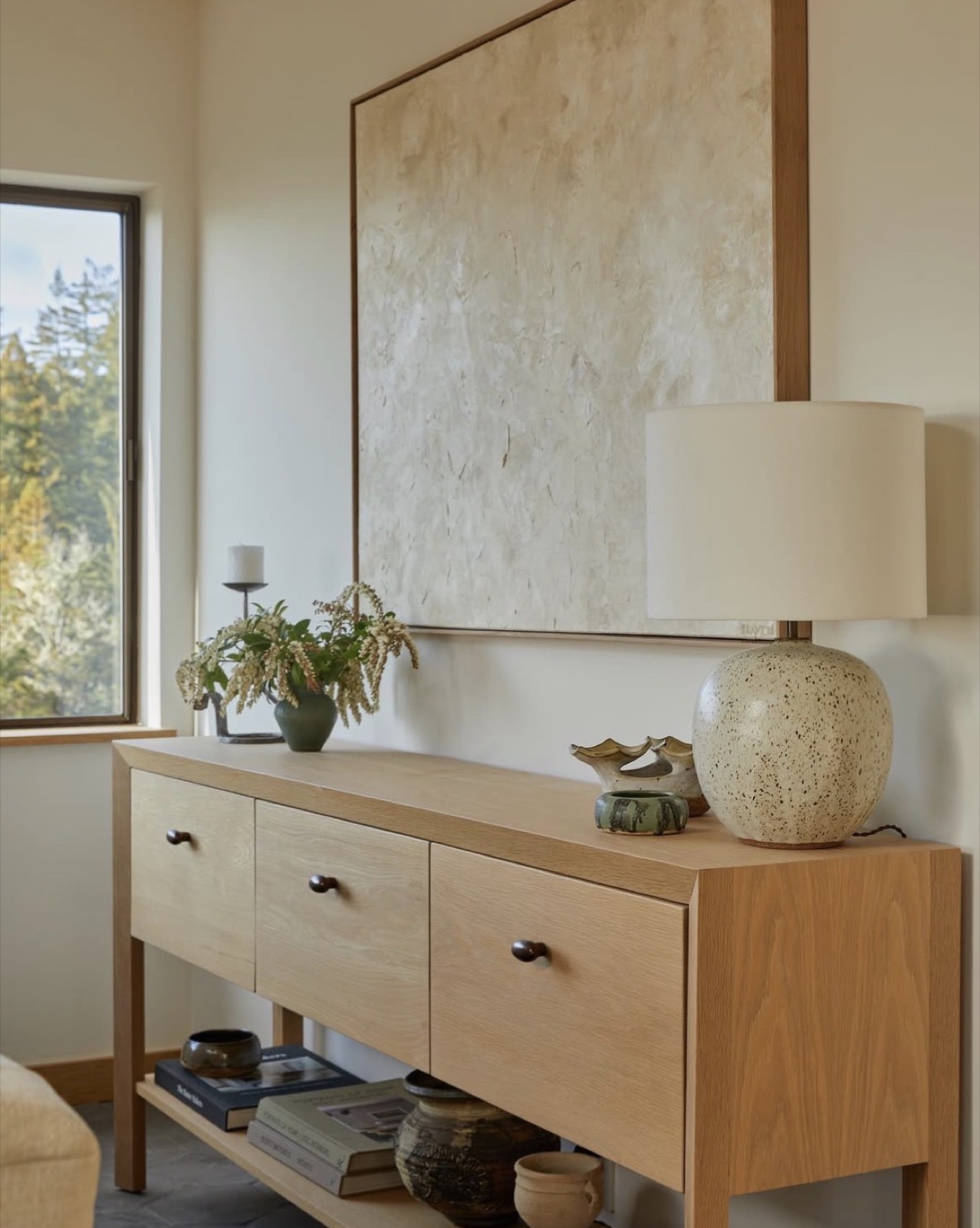 A Julie Brayton canvas in bone and oyster, hung in a private residence